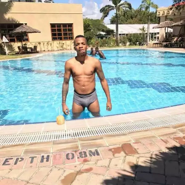 Tekno Shows Off His Big Cassava While in The Pool.